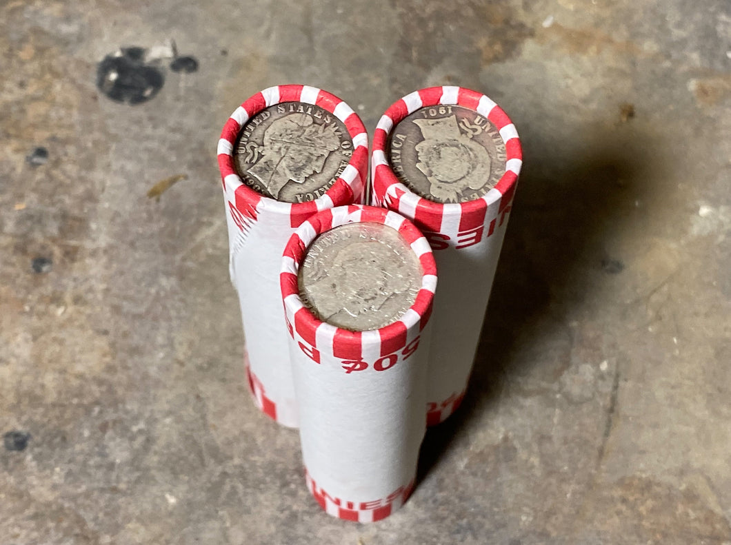 SILVER BARBER DIME showing on end of white old vintage us wheat cent coin penny roll lot estate money sale cents hoard